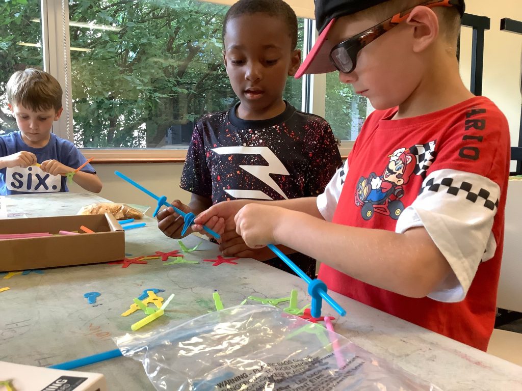 two young boys working together during a STEAM or STEM program